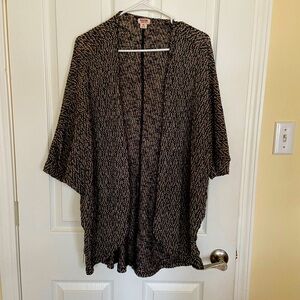 beige and black cardigan